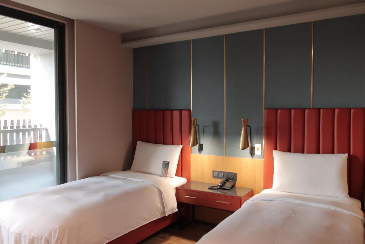 Kindness Day Hotel Тайнань Экстерьер фото